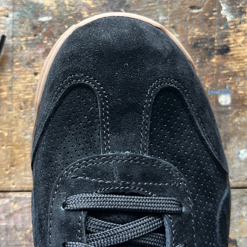 Top view of the Mackall 45 Black + Gum shoe and flat-woven laces
