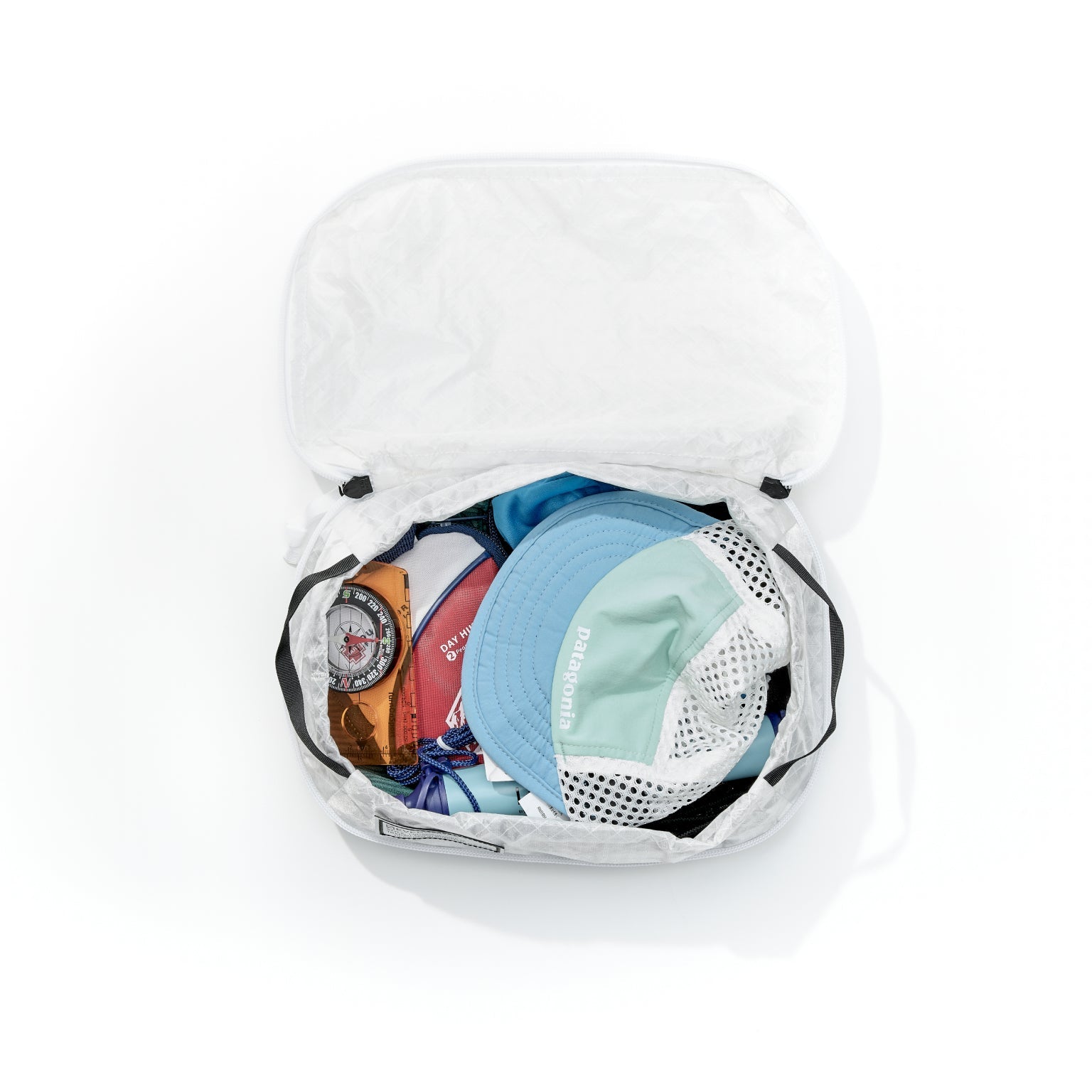 Transit Packing Cube 4L ULTRA packed with travel gear