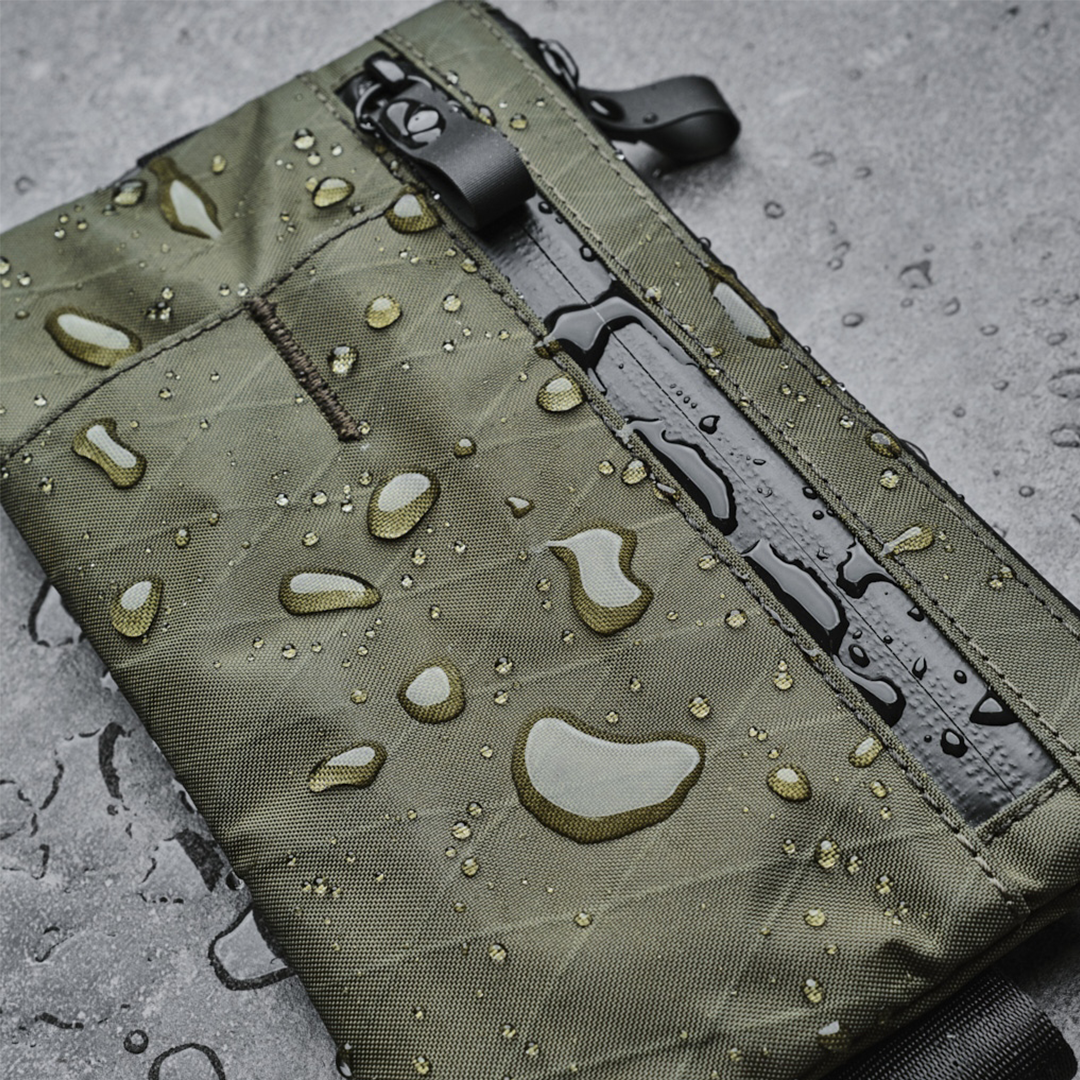 alpaka-zip-clutch-dark-green