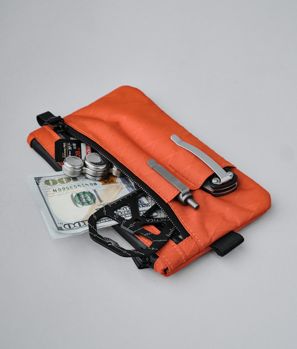 alpaka-zip-clutch-cayenne