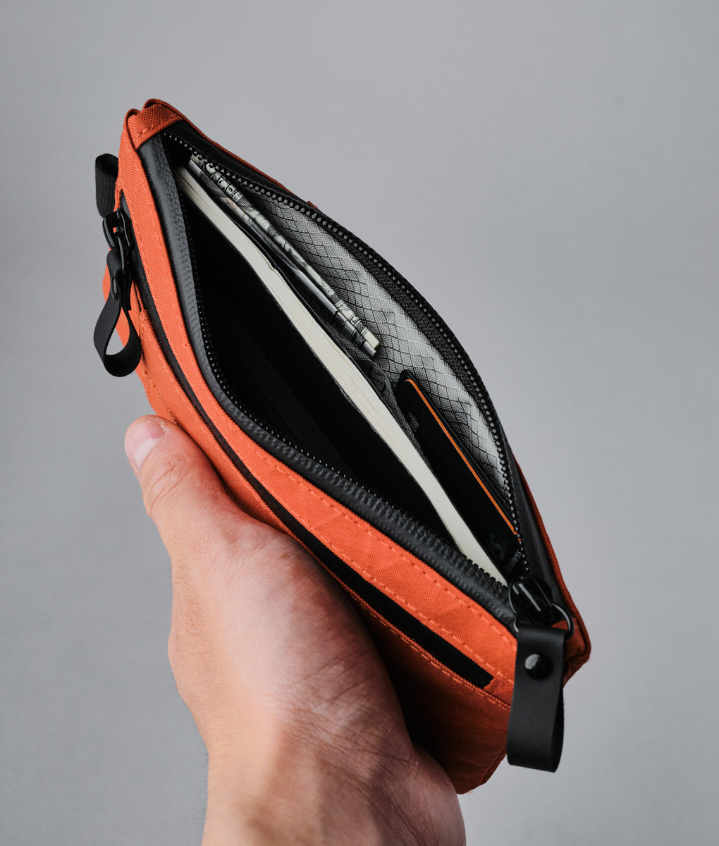alpaka-zip-clutch-cayenne