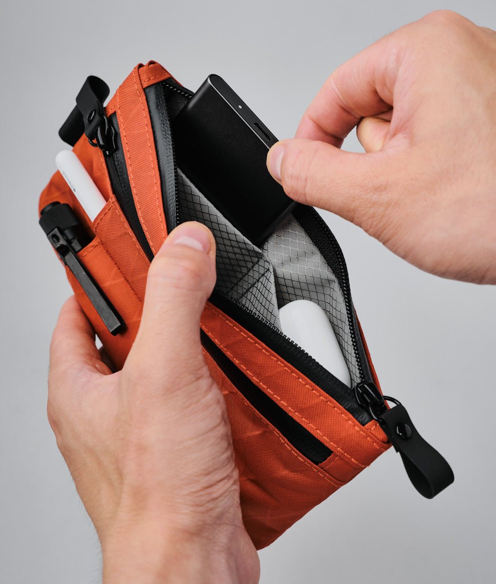 alpaka-zip-clutch-cayenne