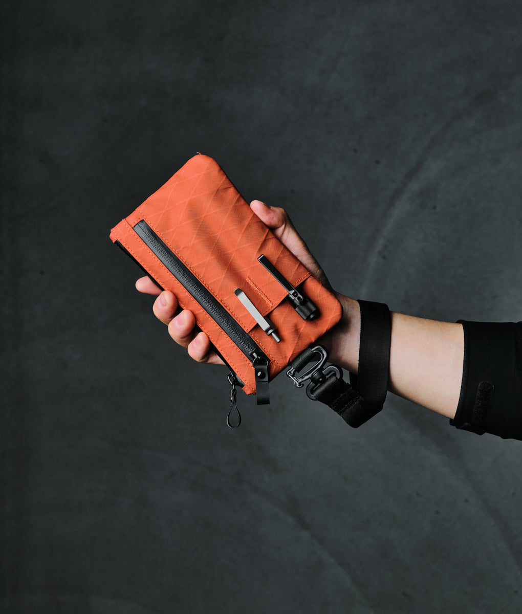 alpaka-zip-clutch-cayenne