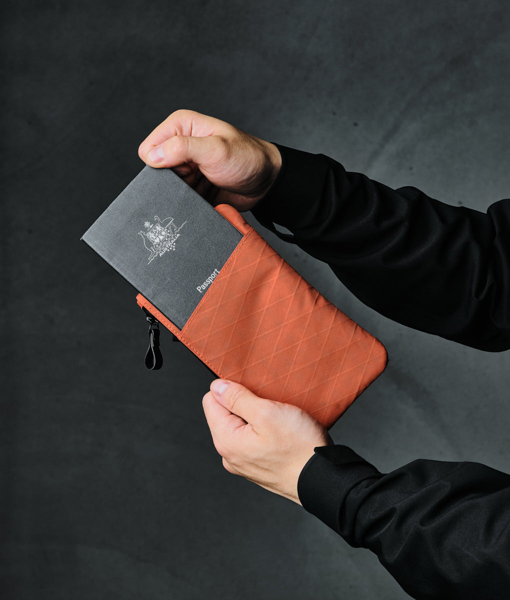 alpaka-zip-clutch-cayenne