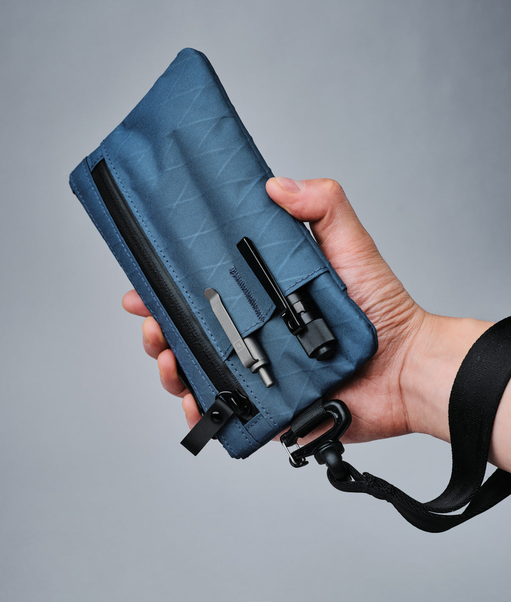 alpaka-zip-clutch-ocean-blue
