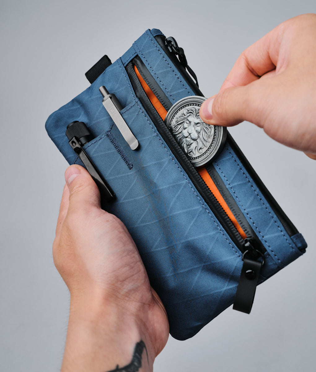 alpaka-zip-clutch-ocean-blue