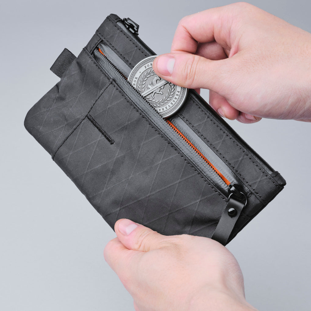 alpaka-zip-clutch-black