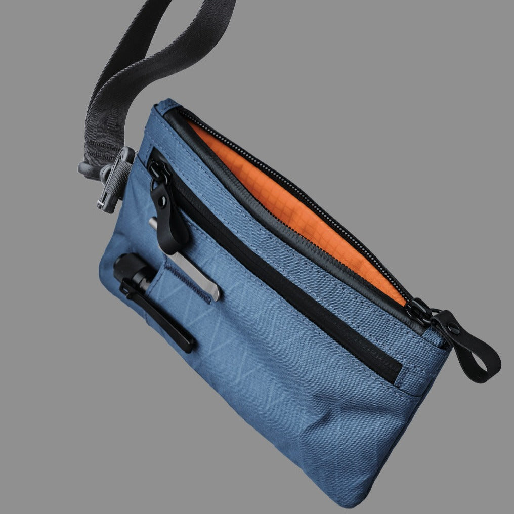alpaka-zip-clutch-ocean-blue