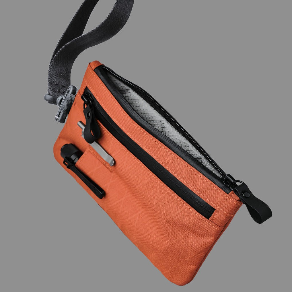 alpaka-zip-clutch-cayenne