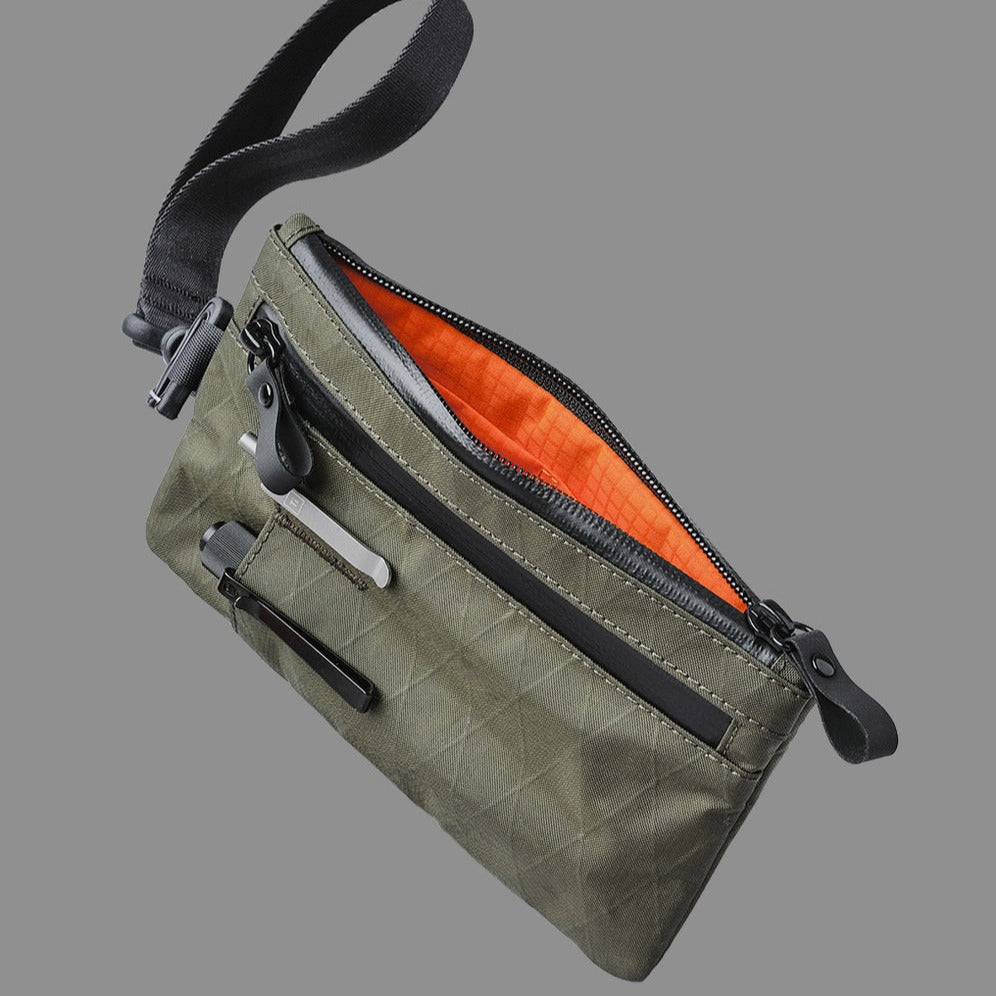 alpaka-zip-clutch-dark-green