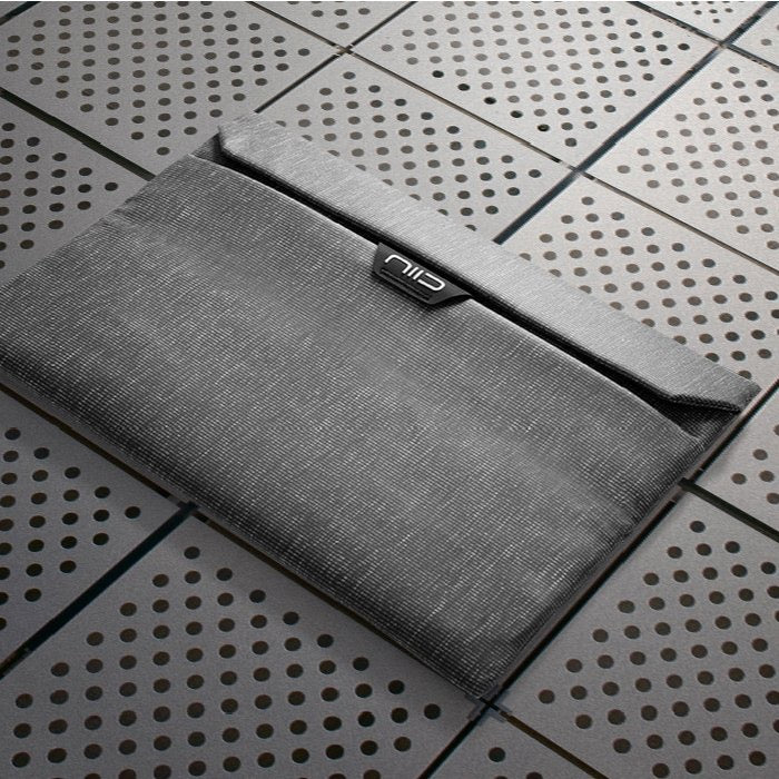 NIID Integrated Laptop Sleeve or Cellphone Pouch - Storming Gravity